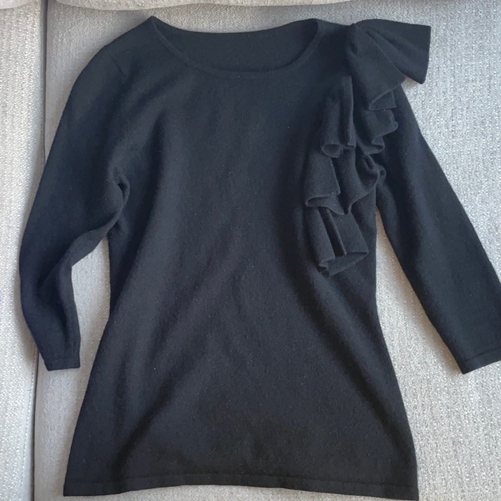 Black sweater with bows